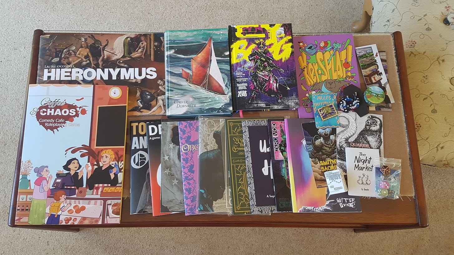 Photo of the games I bought laid out on my coffee table. Games shown listed below.