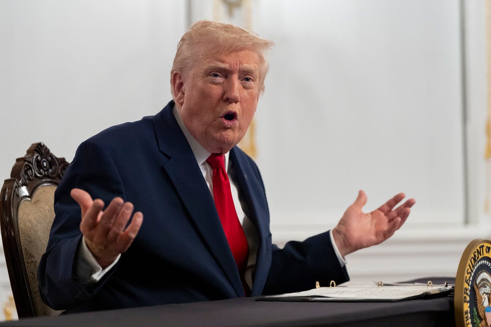 President Donald Trump speaks to reporters.