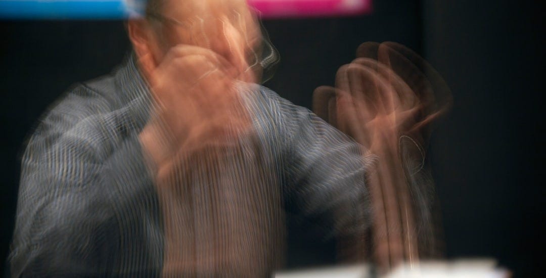man in long-sleeved shirt