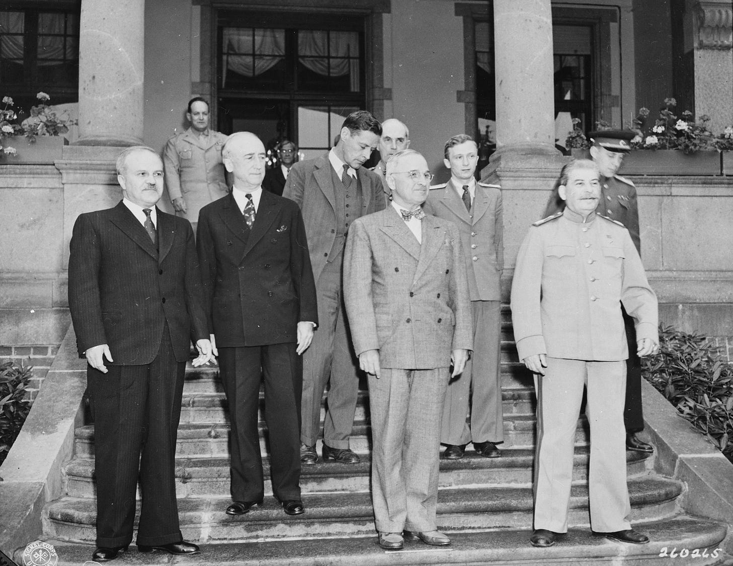 Key leaders Vyacheslav Molotov, James Byrnes, Charles Bohlen, Harry Truman, William Leahy, and Joseph Stalin convene at the historic Potsdam Conference in Germany, July 17, 1945.