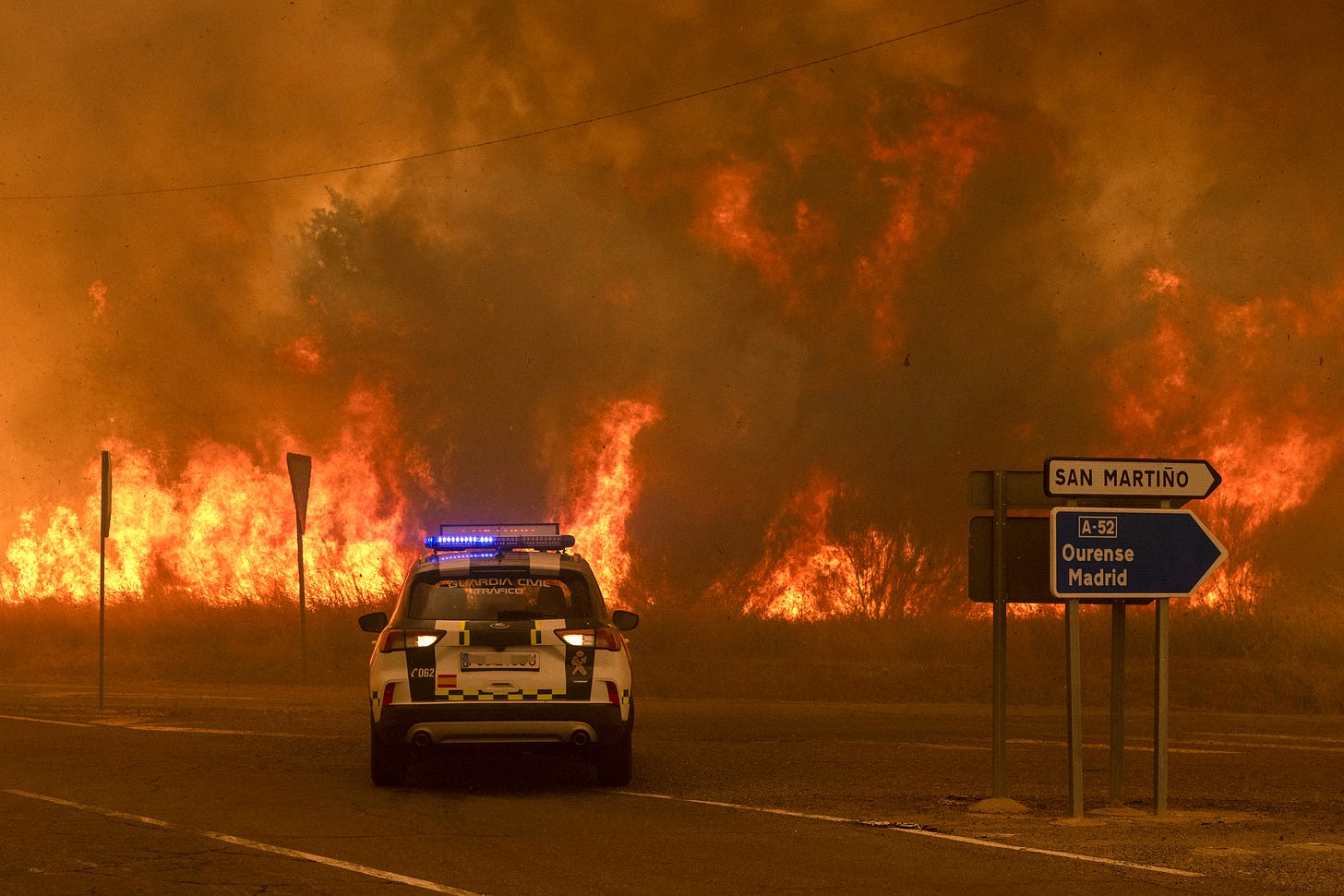 A wildfire in the Cualedro municipality of Galicia in north-west Spain. Widespread blazes cost four lives last month.