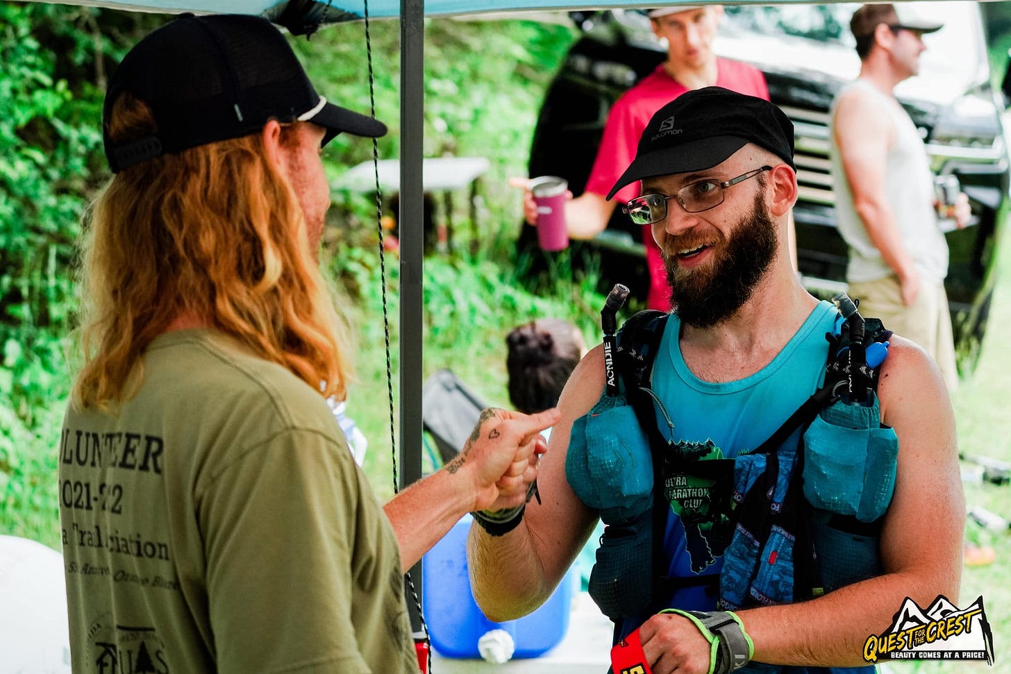 May be an image of 3 people, beard, people standing and outdoors