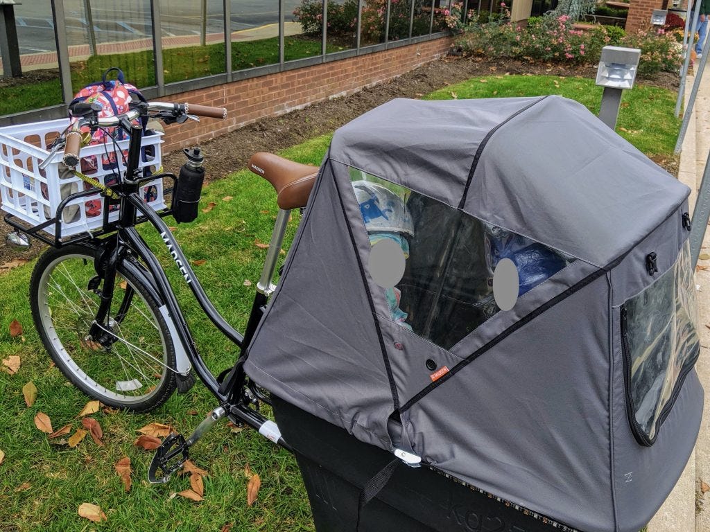 Kids snug in the weather cover