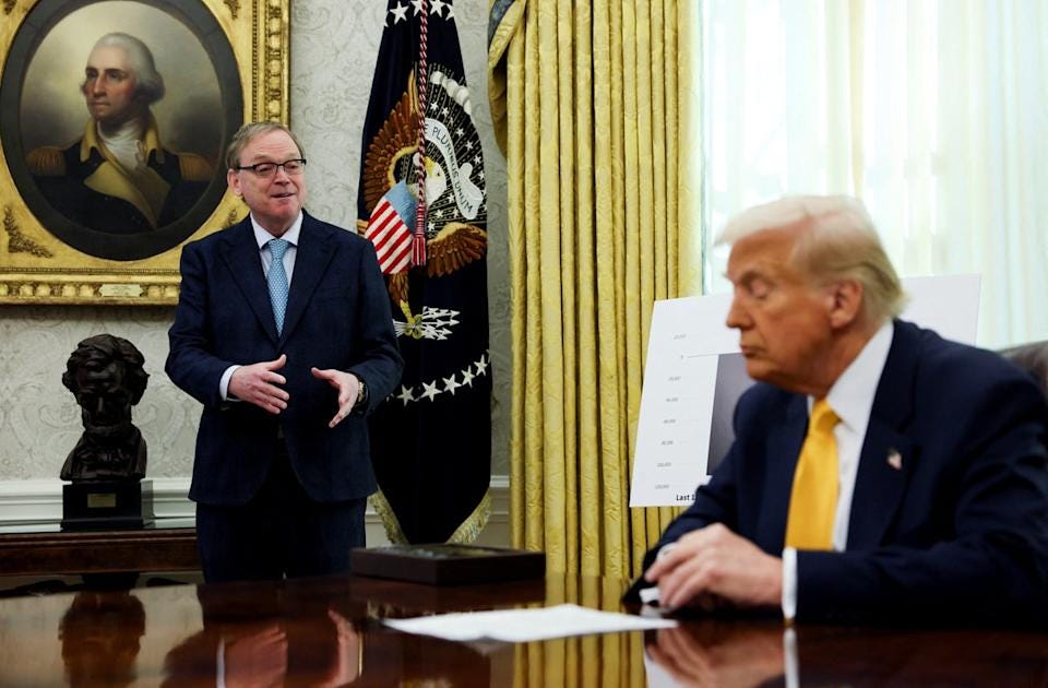 Trump and White House economic adviser Kevin Hassett overlooked by George Washington in a gold frame (Reuters)