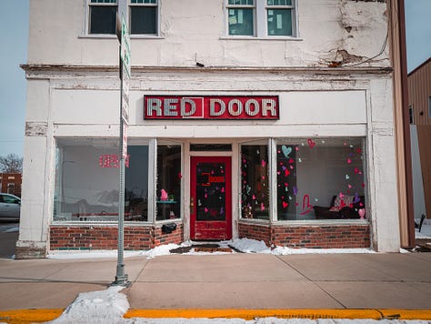 A city full of old stories, now guarded by God, guns, and flags proudly flown.