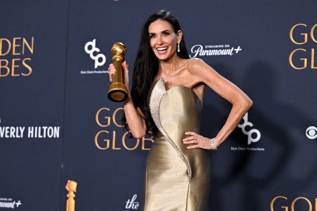 Demi Moore wins her first major acting award at the Golden Globes : NPR