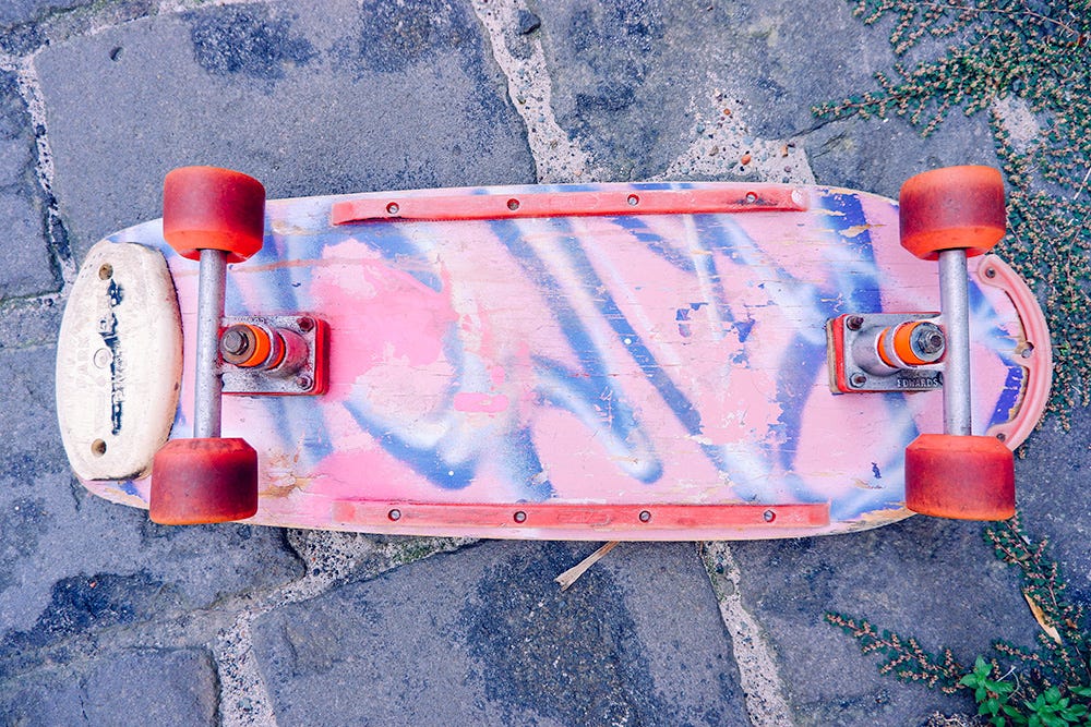 The skateboard lying on the ground. It looks great. The skateboard lying on the ground. It looks great.