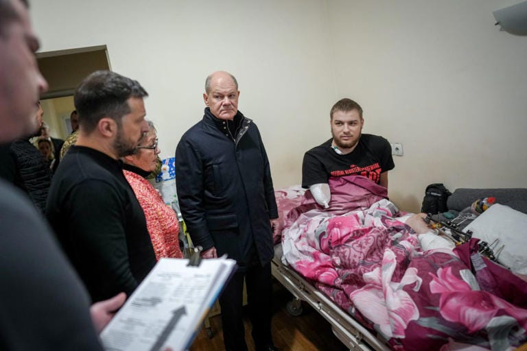 German Chancellor Olaf Scholz (2-R) and Volodymyr Zelensky (2-L), President of Ukraine, visit wounded soldiers in the neurology ward of the state hospital. Chancellor Scholz has arrived in the capital Kiev for his first visit to Ukraine in two and a half years. Kay Nietfeld/dpa