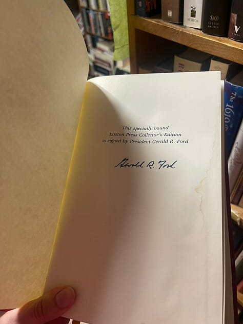 vintage and secondhand books bought in Provincetown, Massachusetts, including Mayflower by Nathaniel Philbrick, Robert Kennedy and His Times by Arthur M. Schlesinger, Jr.