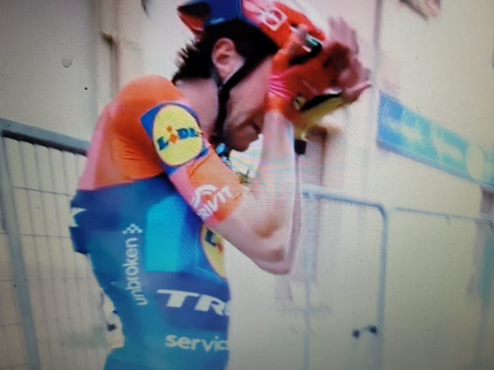 Ciccone with head in hands after taking maglia rosa, Ballerini celebrating his stage win