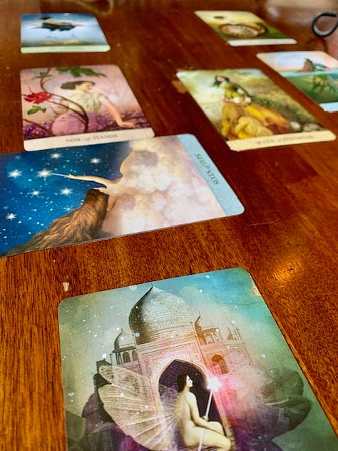 three photos in a row - a tarot card reading, bananas on toast, and frothy waves on the shore