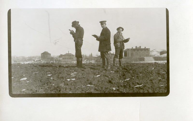 Students with Morrill Hall (Forestry Building) on left and Administration Building on right. Man on left could possibly be Mr. Nichols. Students with Morrill Hall (Forestry Building) on left and Administration Building on right. Man on left could possibly be Mr. Nichols.
