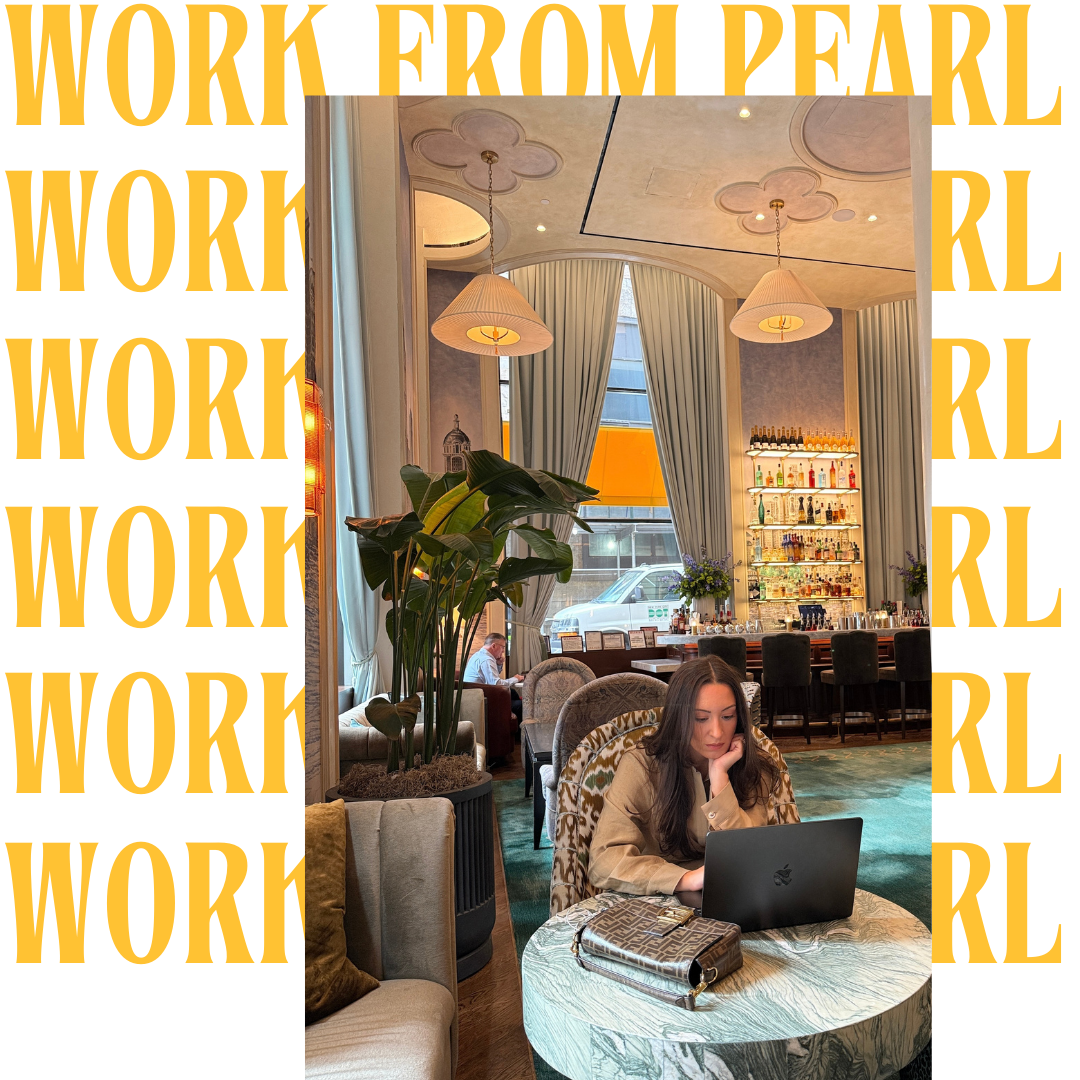 Bella working on her laptop at the Lounge on Pearl