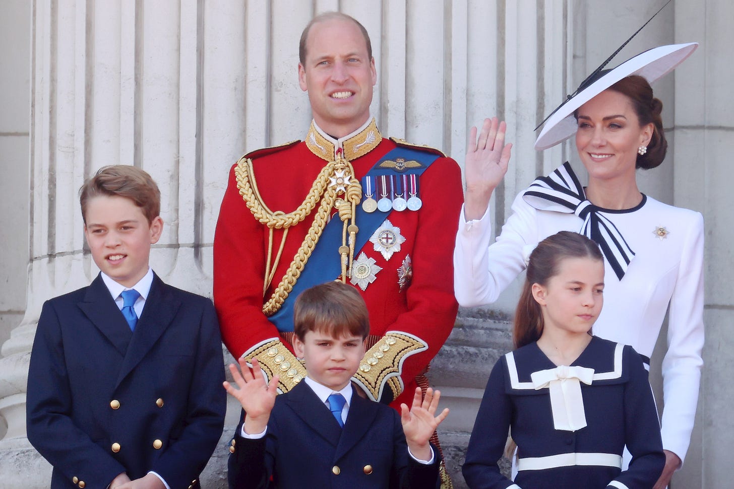 The Prince and Princes of ales with their children on Buckingham Palace balcony