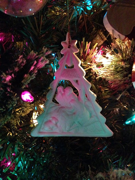 Pictures of Christmas tree and wreath and ornaments, wishing Merry Christmas