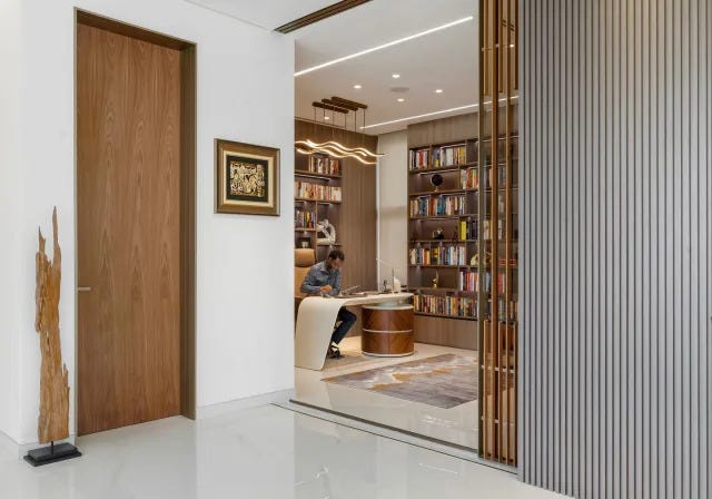 minimalist room with divider and books in the background minimalist room with divider and books in the background