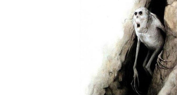 Um monstro saindo da caverna