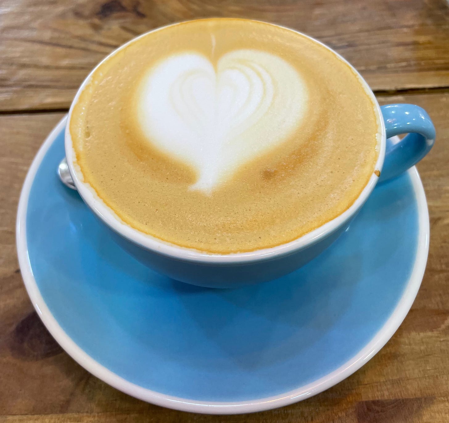 A latte with heart-shaped foam. A small moment of delight during an ordinary day.