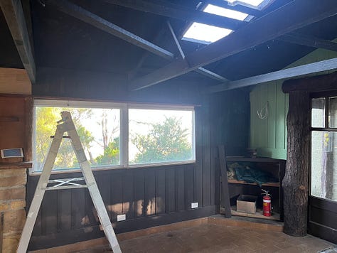 interior photos of an old log cabin with vertical board lining