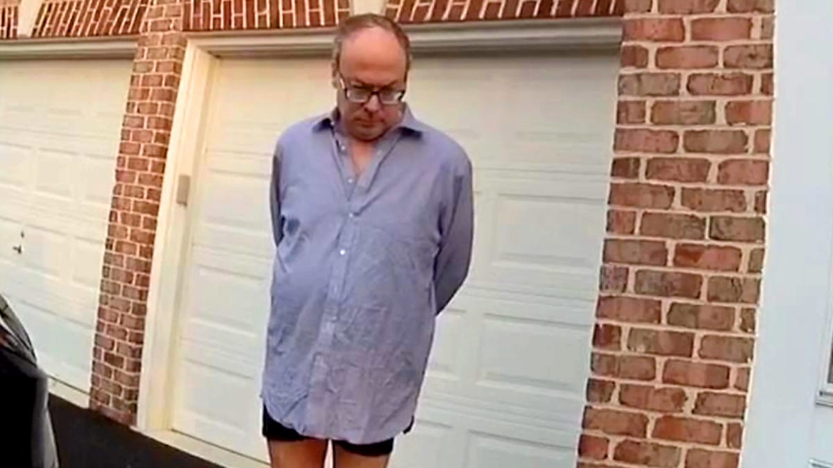 CNN obtains bodycam footage of Trump DOJ lawyer during DOJ raid: 'Can I put  my pants on?'