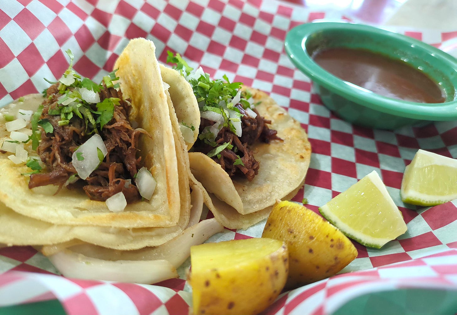 Birria tacos with consommé