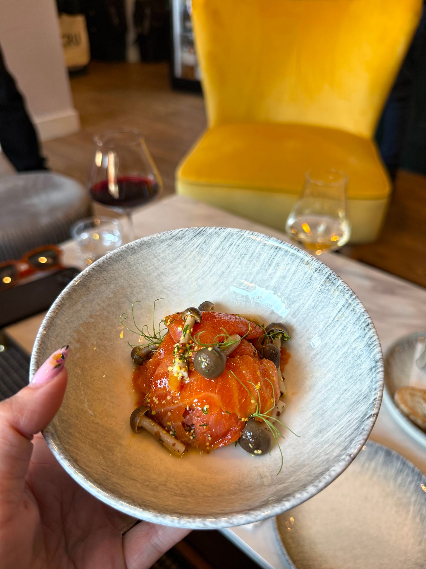 a dish of smoked trout with mushrooms