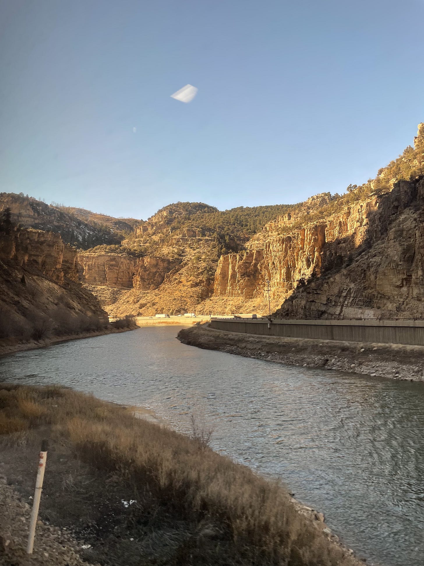 A large canyon with a river running through it.