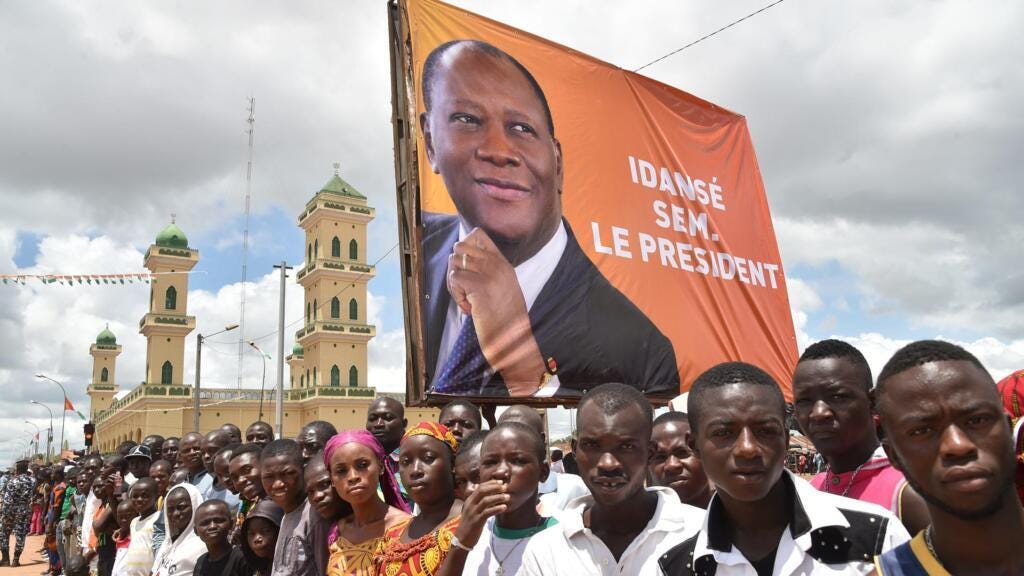Supporters of President Alassane Ouattara wait for his arrival in Daloa, Côte d'Ivoire, on 27 September 2015, during that year's presidential election campaign.