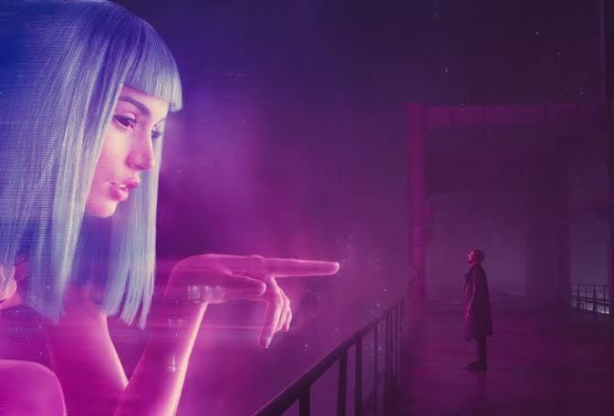 Question. Does this scene depict Joe realising that he will never get to see Joi ever again OR does it depict that he has realised that Joi was only ever programmed to Question. Does this scene depict Joe realising that he will never get to see Joi ever again OR does it depict that he has realised that Joi was only ever programmed to