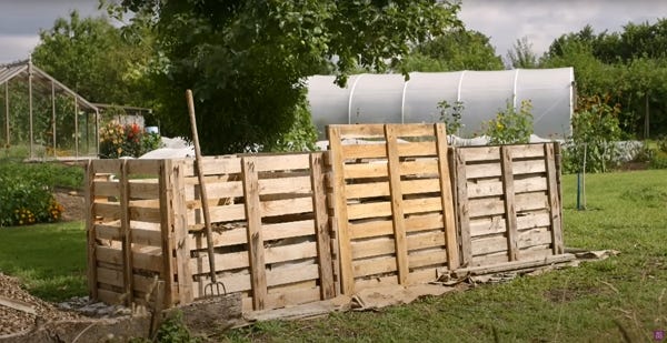Compost heaps made of wood pallets Compost heaps made of wood pallets
