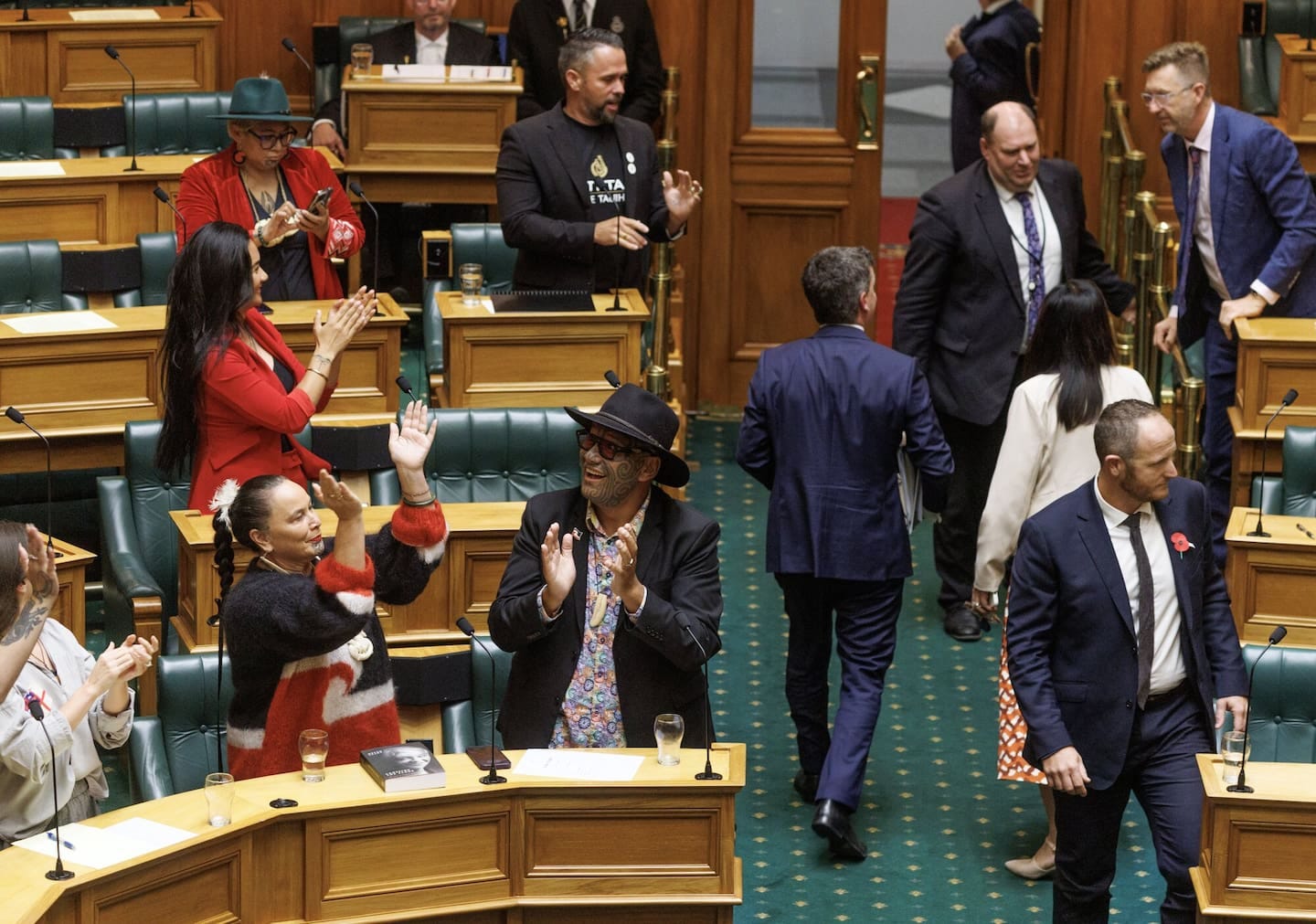 Opposition MPs  celebrate as Act leader David Seymour leaves the House after the Treaty Principles Bill was voted down. Photo / Mark Mitchell