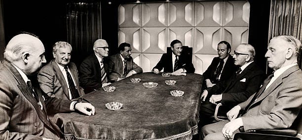 Liverpool chairman John Smith and Club Secretary Peter Robinson attending a board meeting at Anfield, circa 1977. Liverpool chairman John Smith and Club Secretary Peter Robinson attending a board meeting at Anfield, circa 1977.