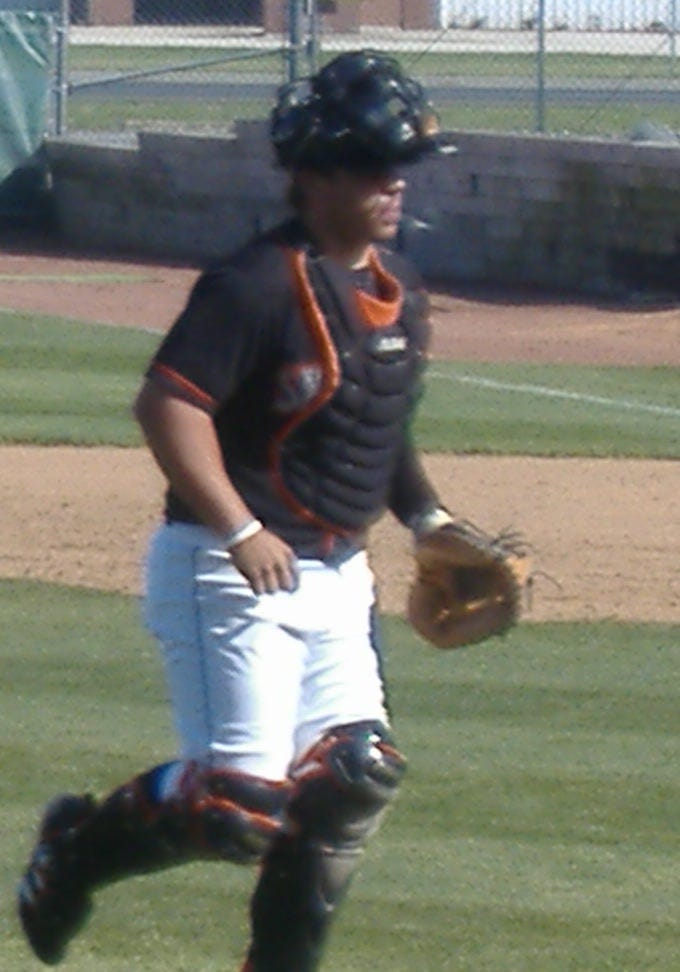 Shorebird catcher Victor Castillo returns to the plate after a mound conference in a recent contest. Shorebird catcher Victor Castillo returns to the plate after a mound conference in a recent contest.