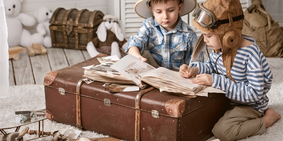 Two boys writing about their imaginary adventures.
