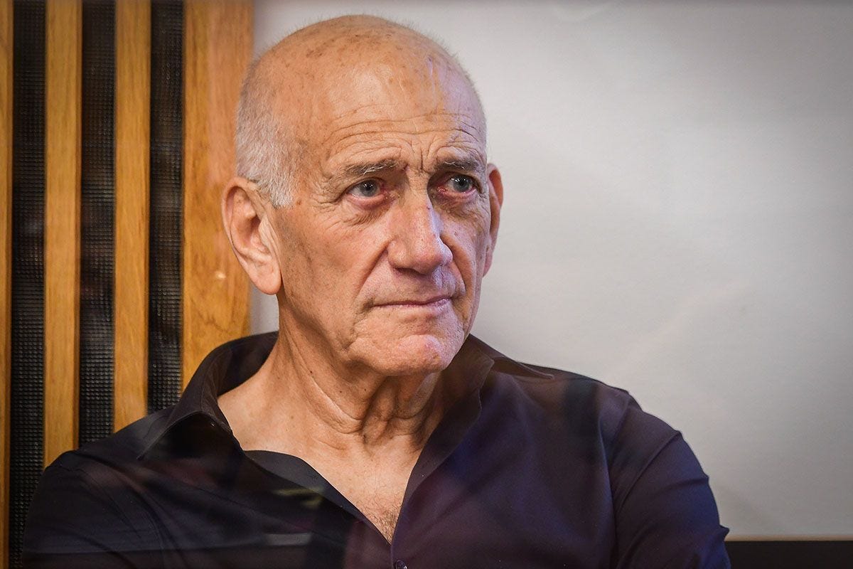 Former Israeli Prime Minister Ehud Olmert arrives for a court hearing on the lawsuit of the Netanyahu family against him, at the Tel Aviv Magistrate's Court on June 12, 2022. (Photo by Avshalom Sassoni/Flash90) Former Israeli Prime Minister Ehud Olmert arrives for a court hearing on the lawsuit of the Netanyahu family against him, at the Tel Aviv Magistrate's Court on June 12, 2022. (Photo by Avshalom Sassoni/Flash90)