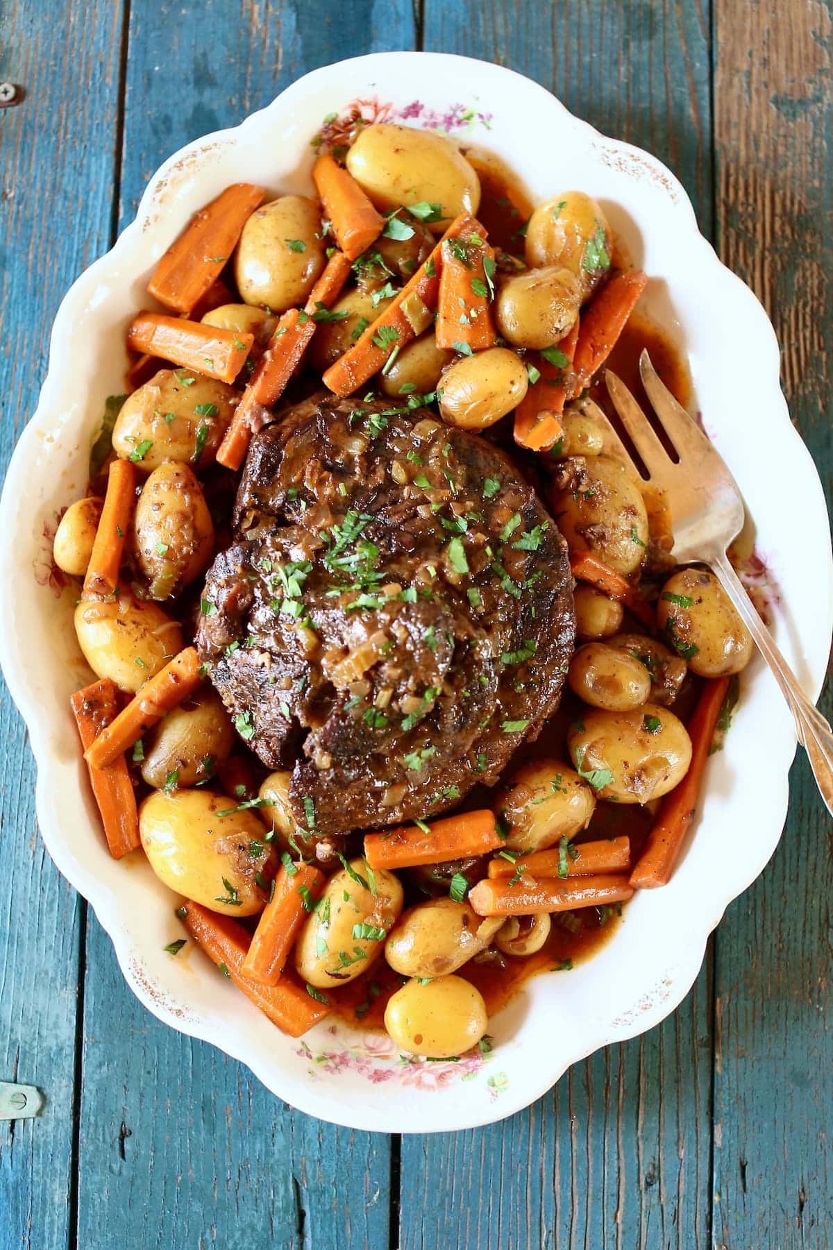 an overhead photo of pot roast on a platter.
