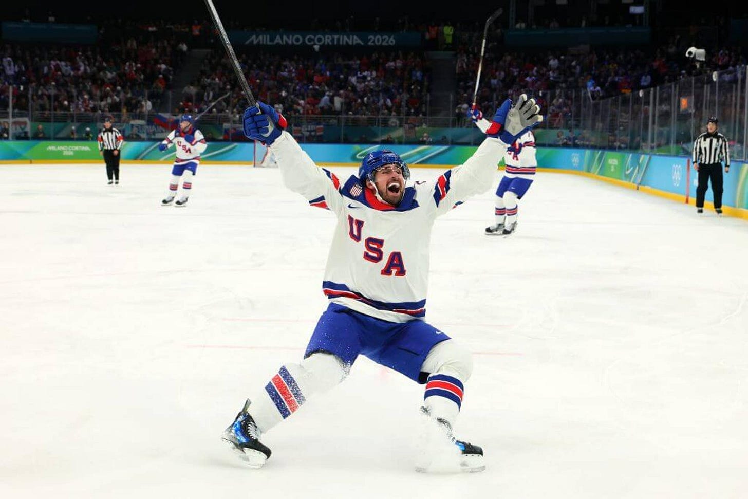 Dylan Larkin of Team USA raises his hands and stick to celebrate a goal in the first period during a semifinal match on February 20 in Milan. Dylan Larkin of Team USA raises his hands and stick to celebrate a goal in the first period during a semifinal match on February 20 in Milan.