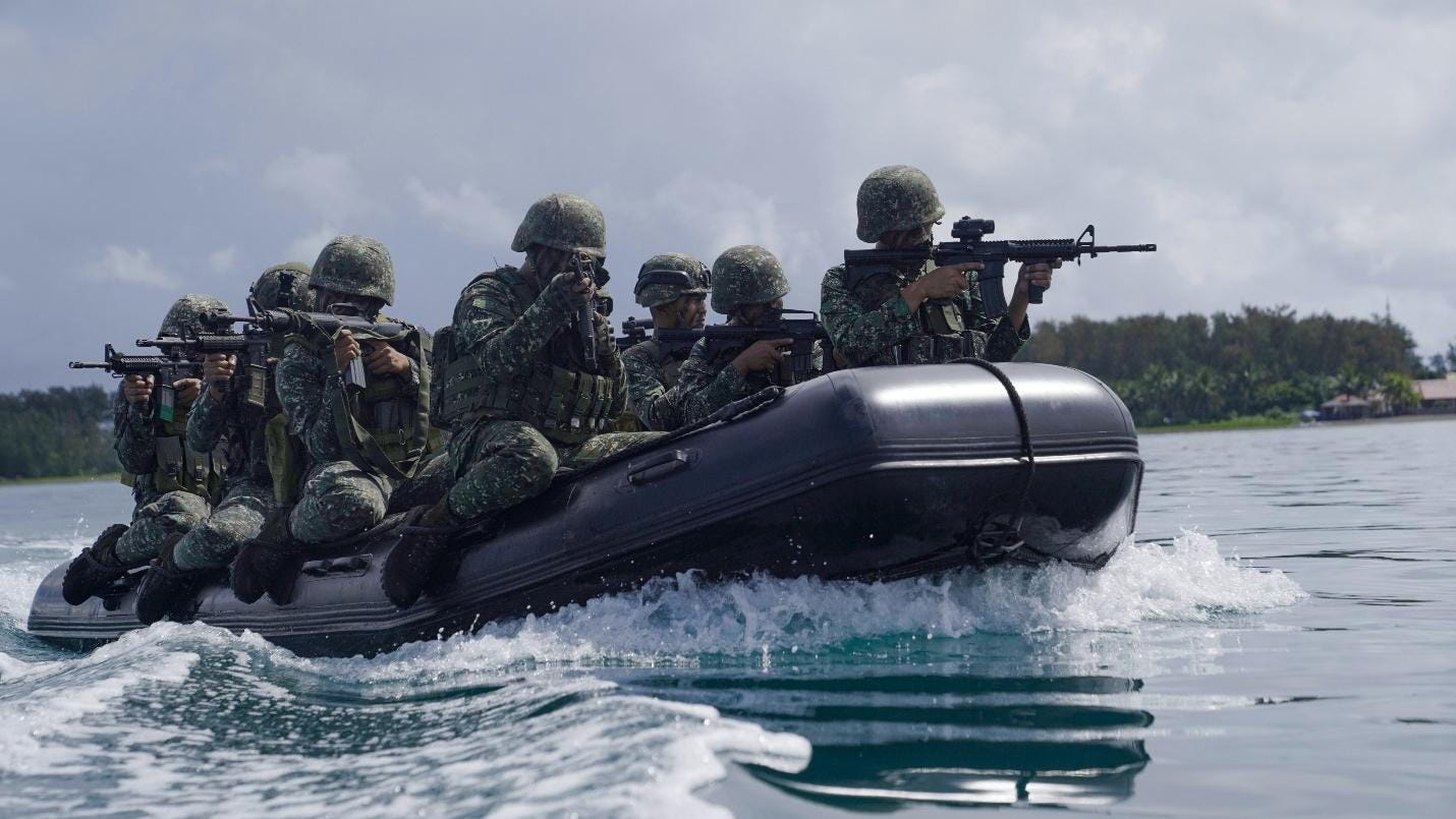 A group of soldiers in a boat with guns
AI-generated content may be incorrect. A group of soldiers in a boat with guns
AI-generated content may be incorrect.