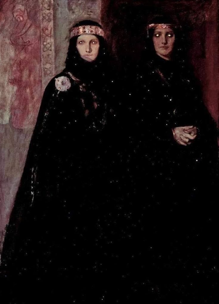 This may contain: two women dressed in black standing next to each other