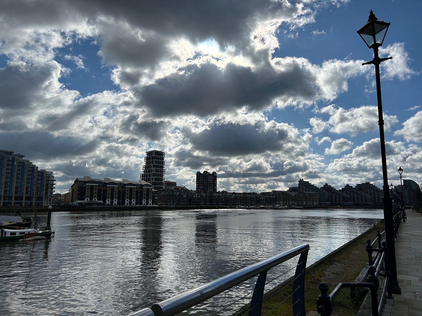 Ink black Thames under moody skies Ink black Thames under moody skies