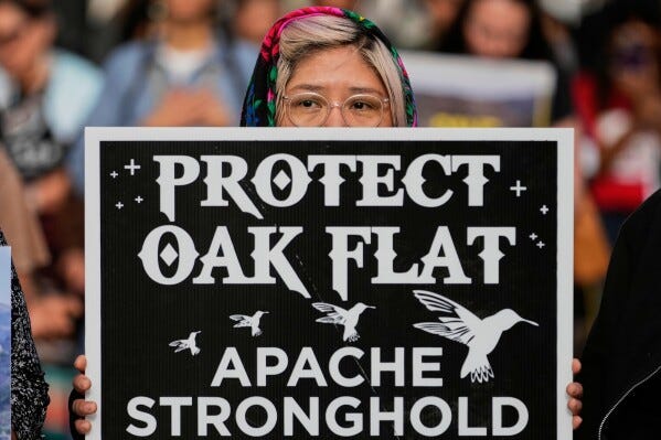 Members of Apache and others who want to halt a massive copper mining project on federal land in Arizona gather outside the U.S. District Court, May 7, 2025, in Phoenix. (AP Photo/Matt York, File)