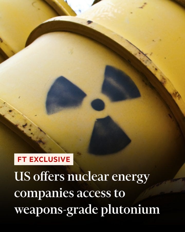 Yellow industrial barrels stacked together with a black radiation trefoil symbol stenciled on one barrel and overlaid text reading US offers nuclear energy companies access to weapons-grade plutonium along with FT exclusive label