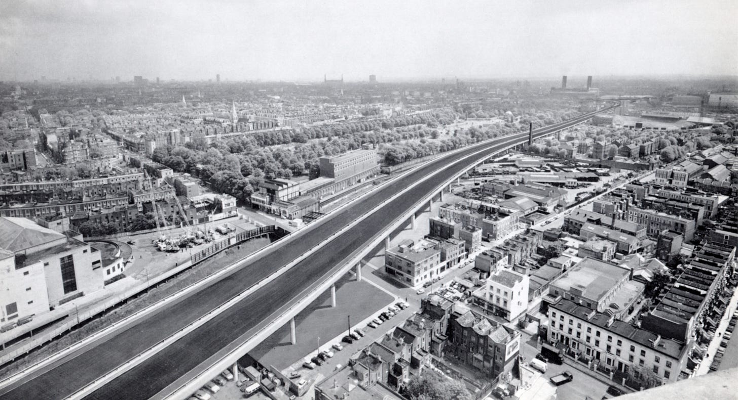 Photomontage showing an elevated motorway passing through an aerial photograph of West London