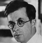 A person wearing round glasses

Description automatically generated