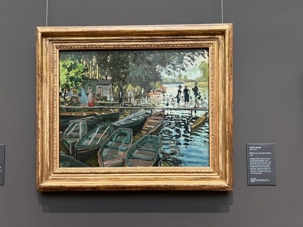 A framed painting of boats on a wall

AI-generated content may be incorrect.