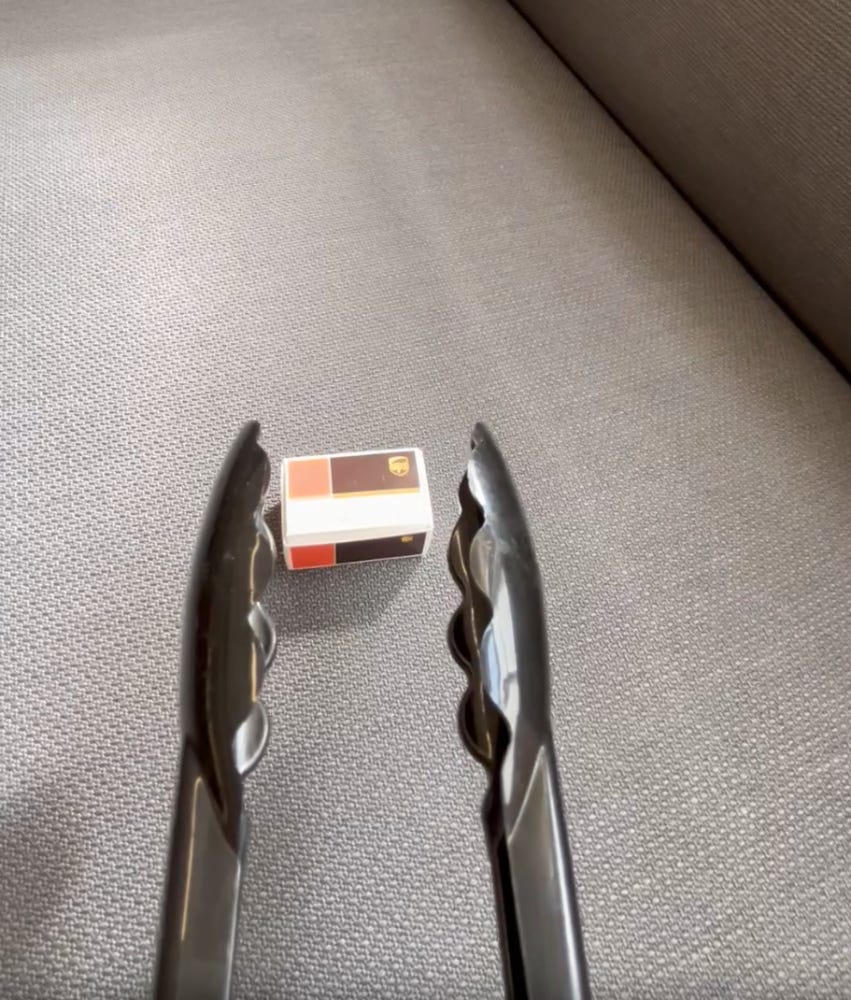 Image from one of the videos of picking up and moving an object