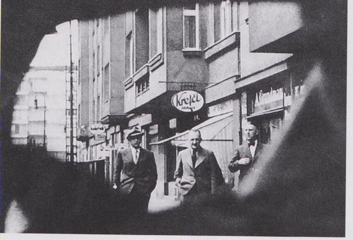 A rare, secretly taken Gestapo photo from 1938 shows Paul Thümmel (aka A-54) with Czech agents in Prague. Thümmel, a double agent known as 'Traitor X,' was executed in 1945.