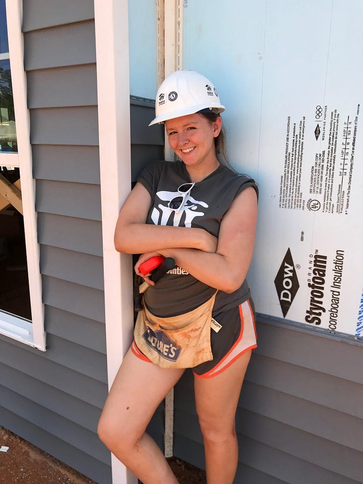 Jimmy Carter in his 80s on a construction build site, smiling; me in my 20s on a construction site smiling