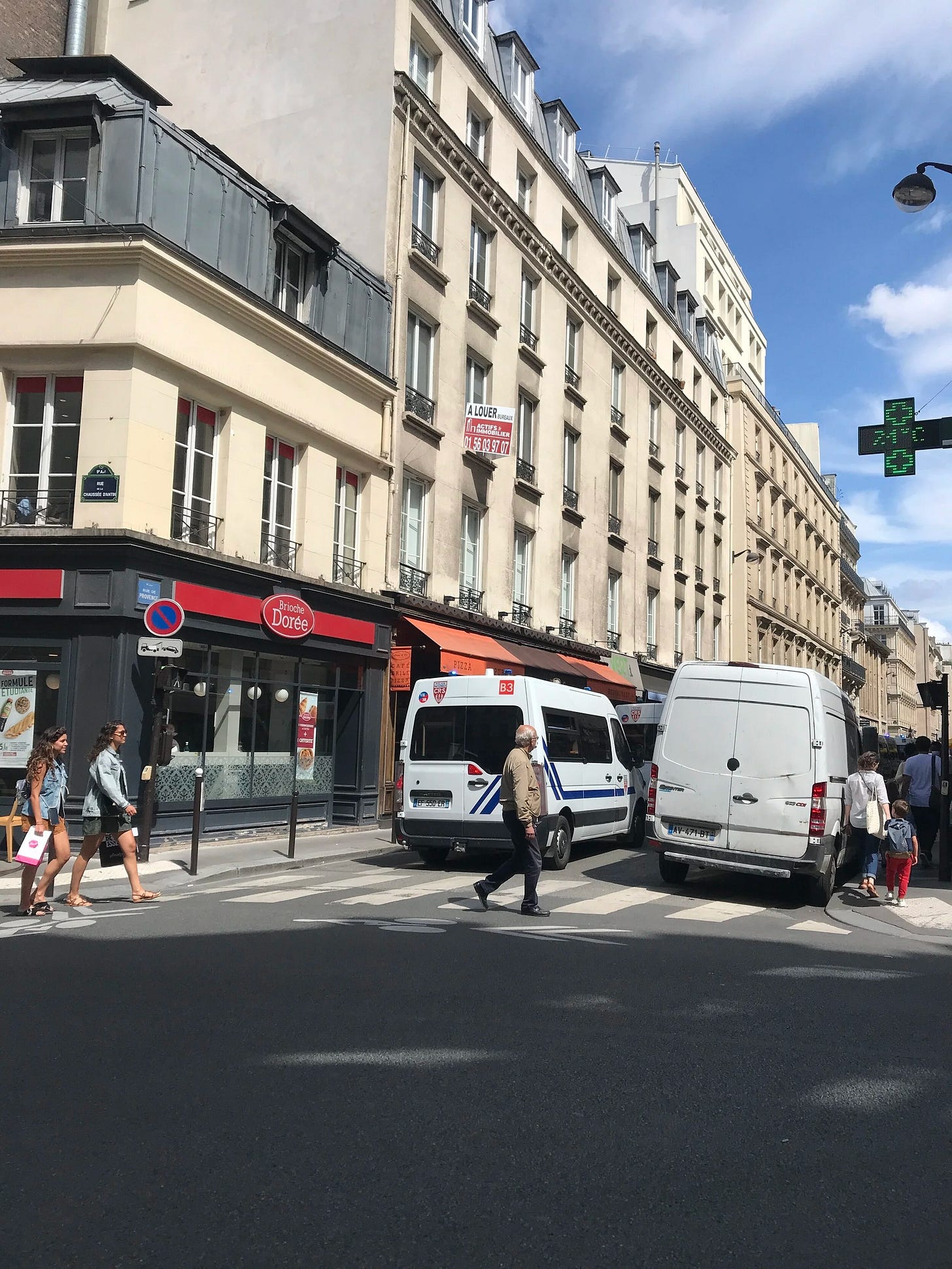 Police vans blocking streets during the anti-covid vaccine protest in Paris Police vans blocking streets during the anti-covid vaccine protest in Paris