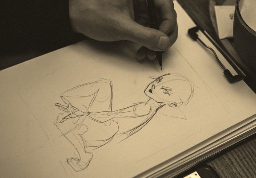man drawing portrait of man man drawing portrait of man